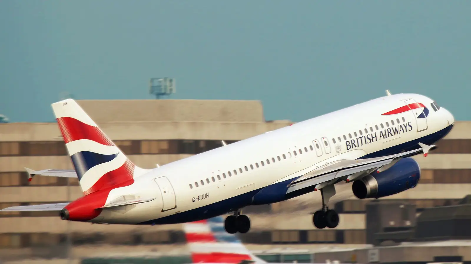 Commercial passenger aircraft taking off from an international airport runway